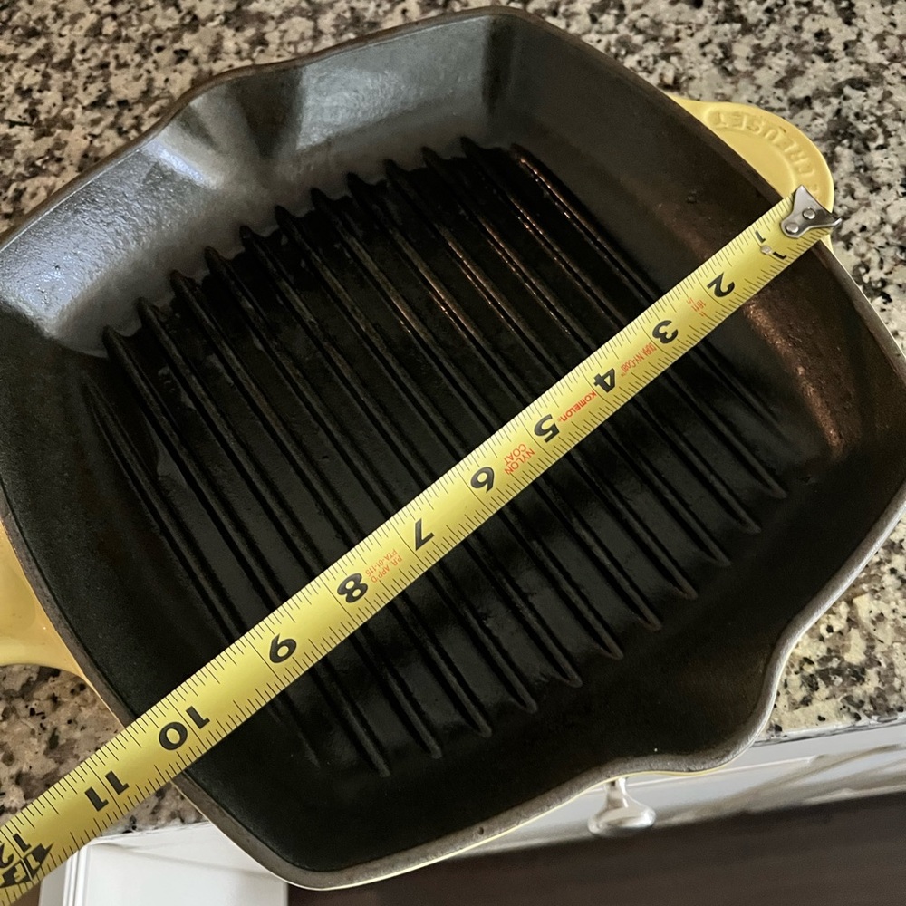 Le Creuset 10 inch cast iron square grill pan.